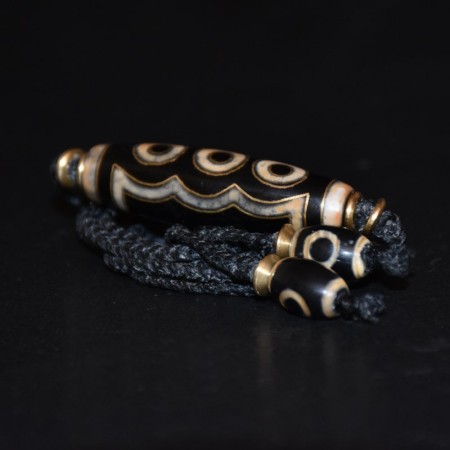 Five eye dzi bead with brass inlay macramé choker necklace