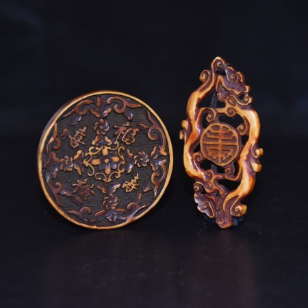 Two antique tibetan Bone / Resin Amulets