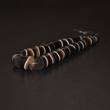 Strand with antique Idar Oberstein One-Line Tube Agate Beads