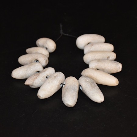 Thirteen ancient neolithic Quartz Tooth Pendant Amulets