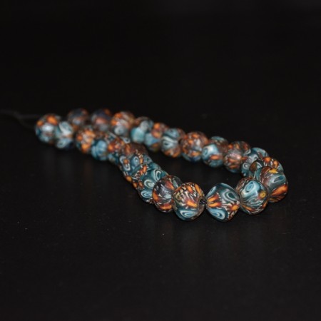 Strand with antique islamic mosaic glass beads