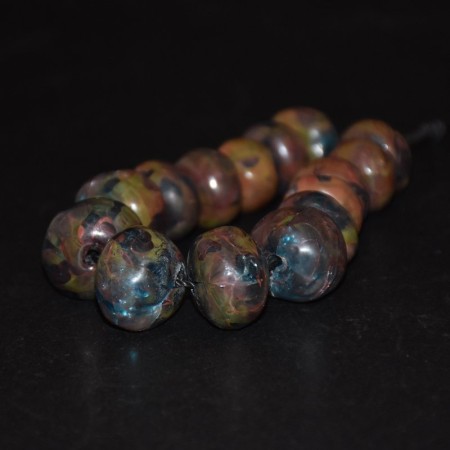Strand with rare antique copper wire glass beads