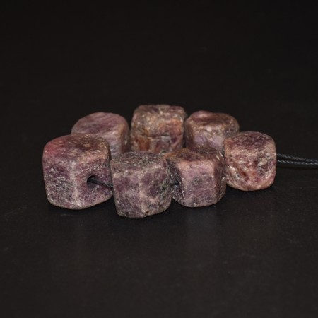 Seven large hexagonal ruby crystal beads