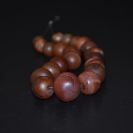 Graduated strand with ancient carnelian beads 