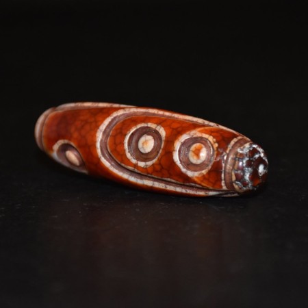 Rare large red carved tibetan six eye dzi bead
