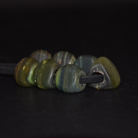 Rare antique green banded and wounded glass beads from Afghanistan