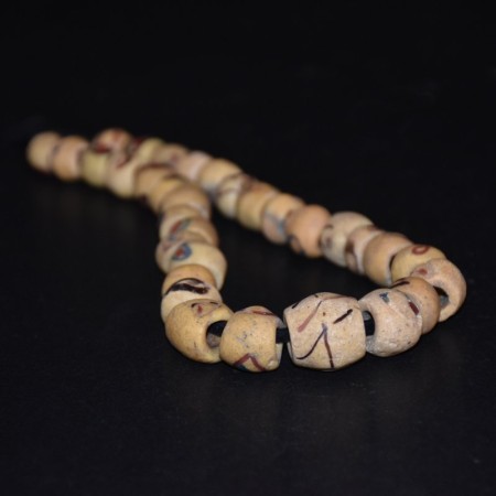 Rare graduated Strand with antique yellow Akoso Tribe Glass Beads