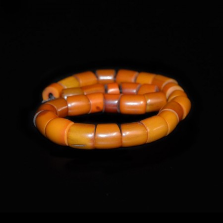 String of antique simulated Amber beads