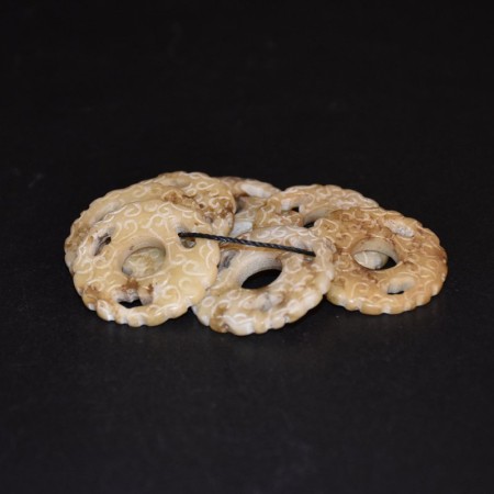 Seven vintage carved Hongshan Jade Ring Amulets