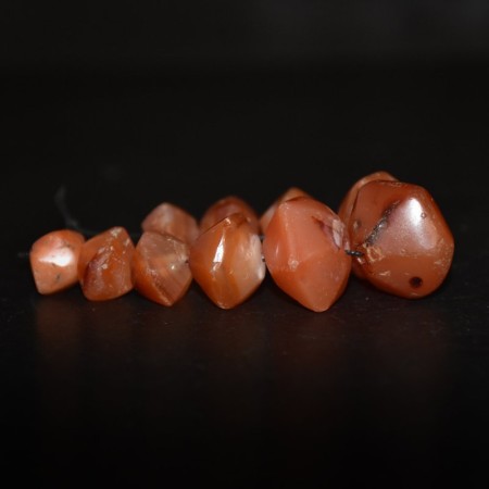 Nine graduated ancient facetted Carnelian Beads 