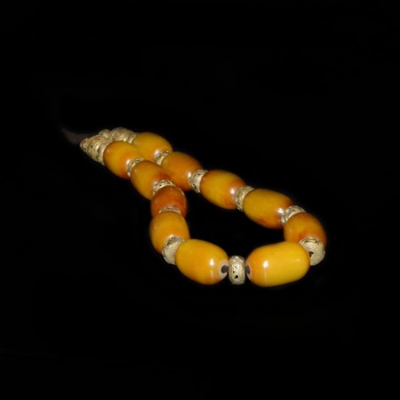 Strand of antique simulated Amber and Brass Beads