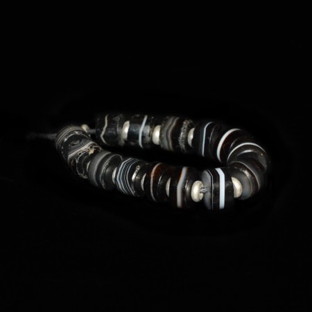Small strand of ancient black-white banded Agate Beads