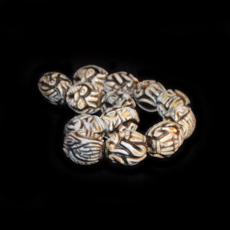 Thirteen carved tibetan Agate Beads