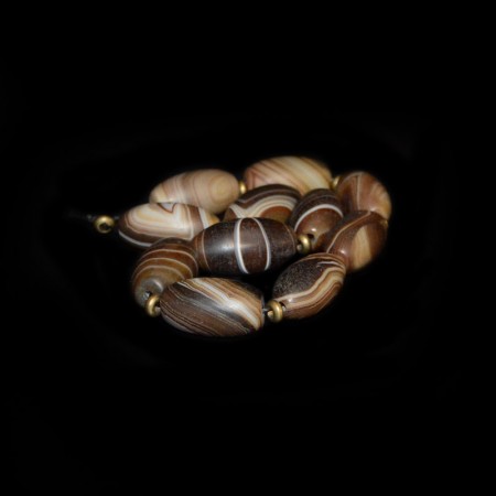 Strand with oval banded tibetan Agate Beads