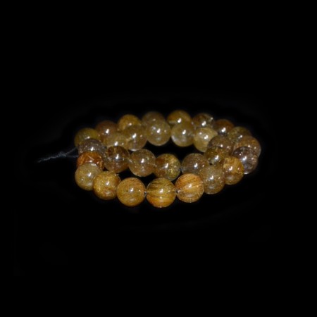 Strand golden rutilated Quartz / Rock Crystal Beads